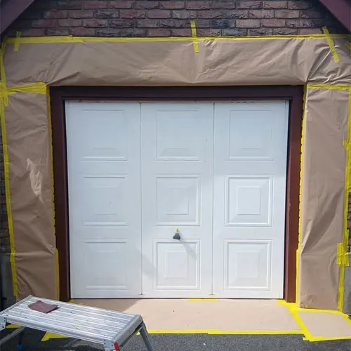 Spray Sense NI panelled garage door before
