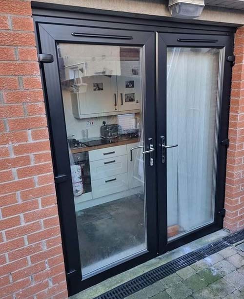 Black painted UPVC patio doors
